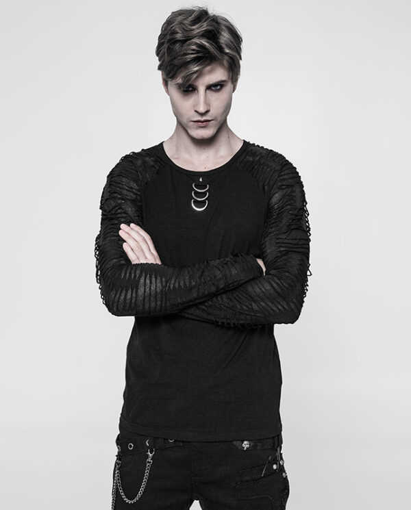 Haut déchiré à spike et anneaux