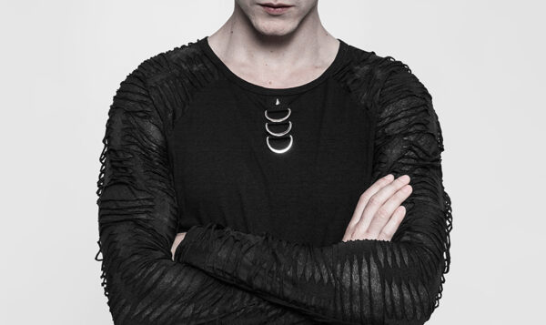 Haut déchiré à spike et anneaux