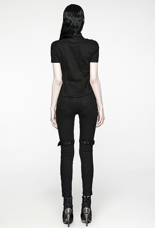 Jeans à découpes et à clous