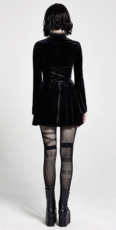 Robe en velours à plastron brodé et ruban