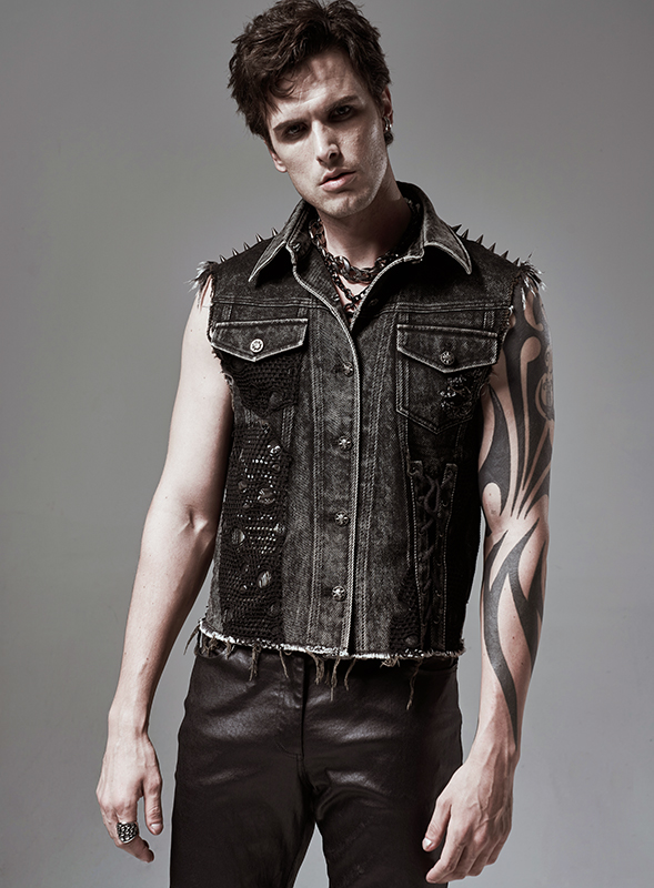 Veste en jeans déchiré à résille et spikes